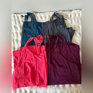 Set of 4 size L Victoria Secret Sport tanks